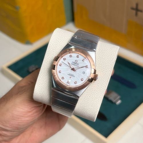 OMEGA CONSTELLATION TWO TONE MARBLE PEARL DIAL